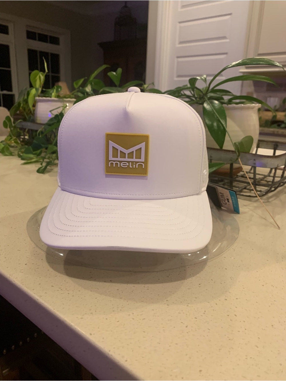 Melin White Trucker Hat with Gold Logo Patch